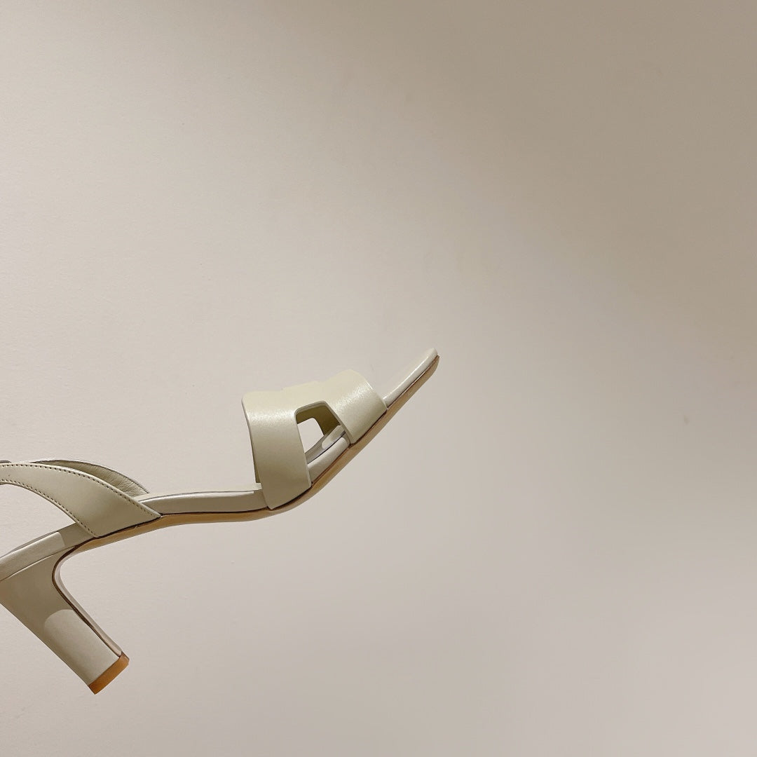 HERMES HOLY 75 SANDAL IN WHITE CREAM CALFSKIN