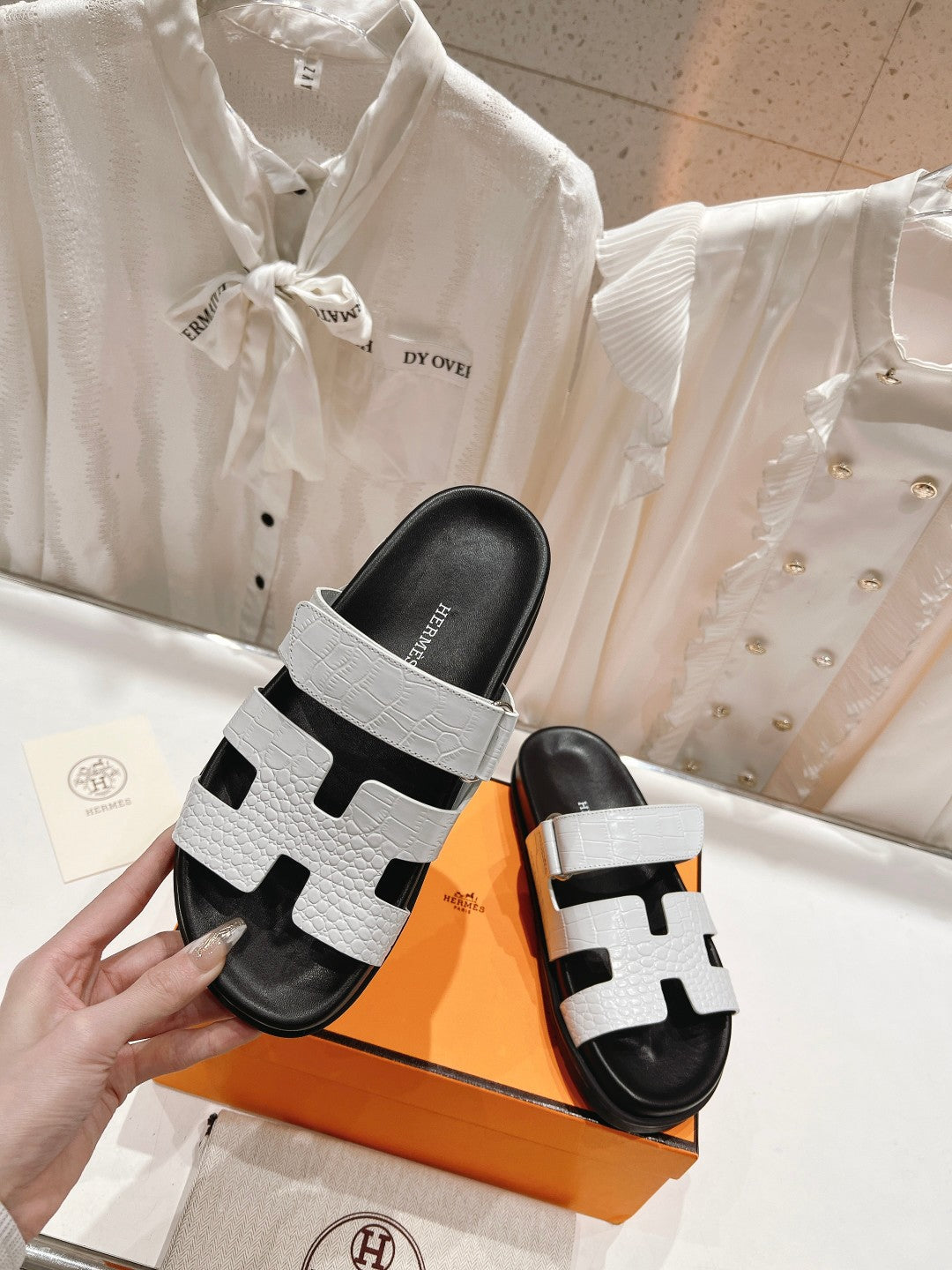 HERMES CHYPRE SANDAL BLACK AND WHITE LAMBSKIN