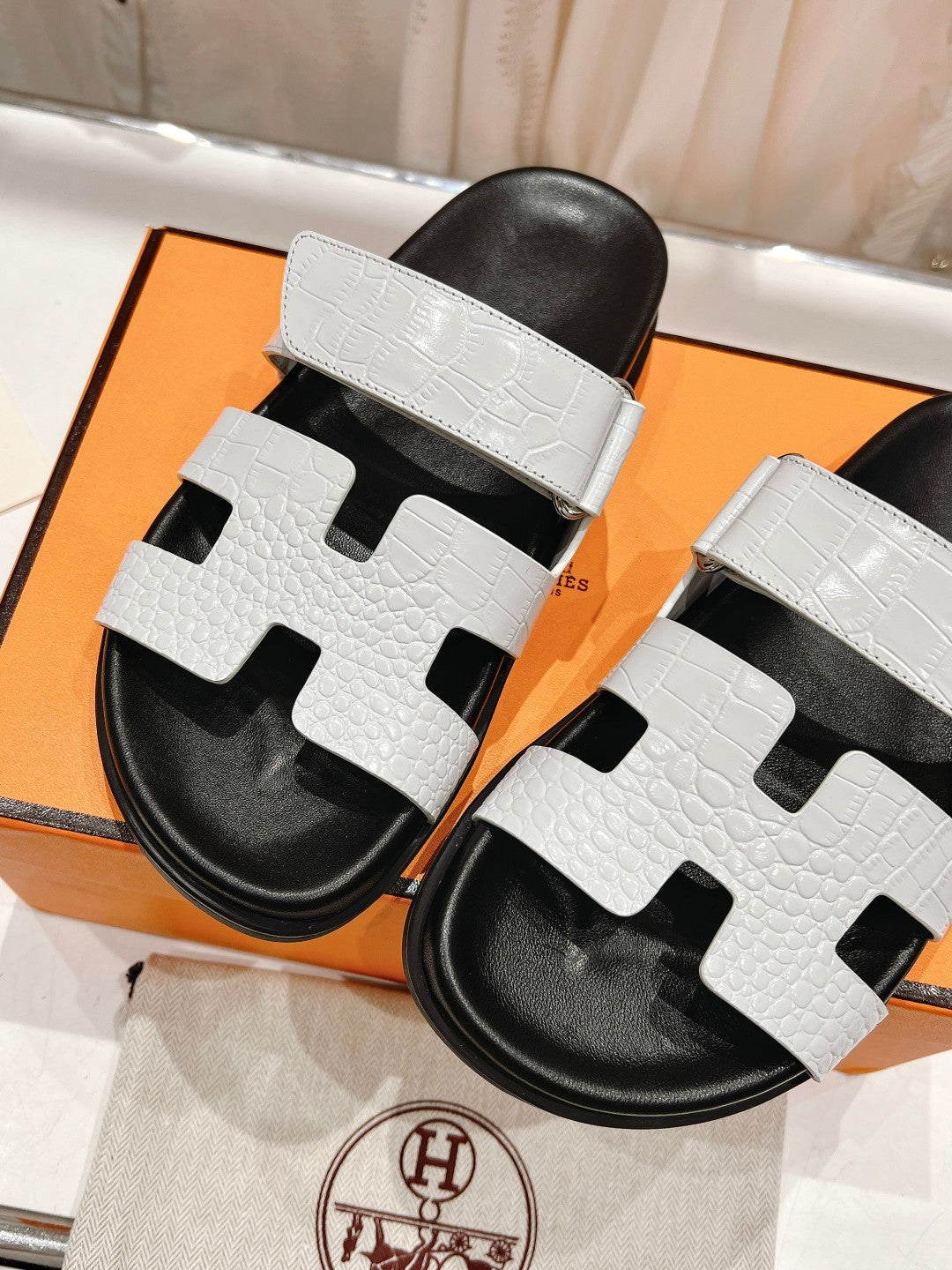 HERMES CHYPRE SANDAL BLACK AND WHITE LAMBSKIN