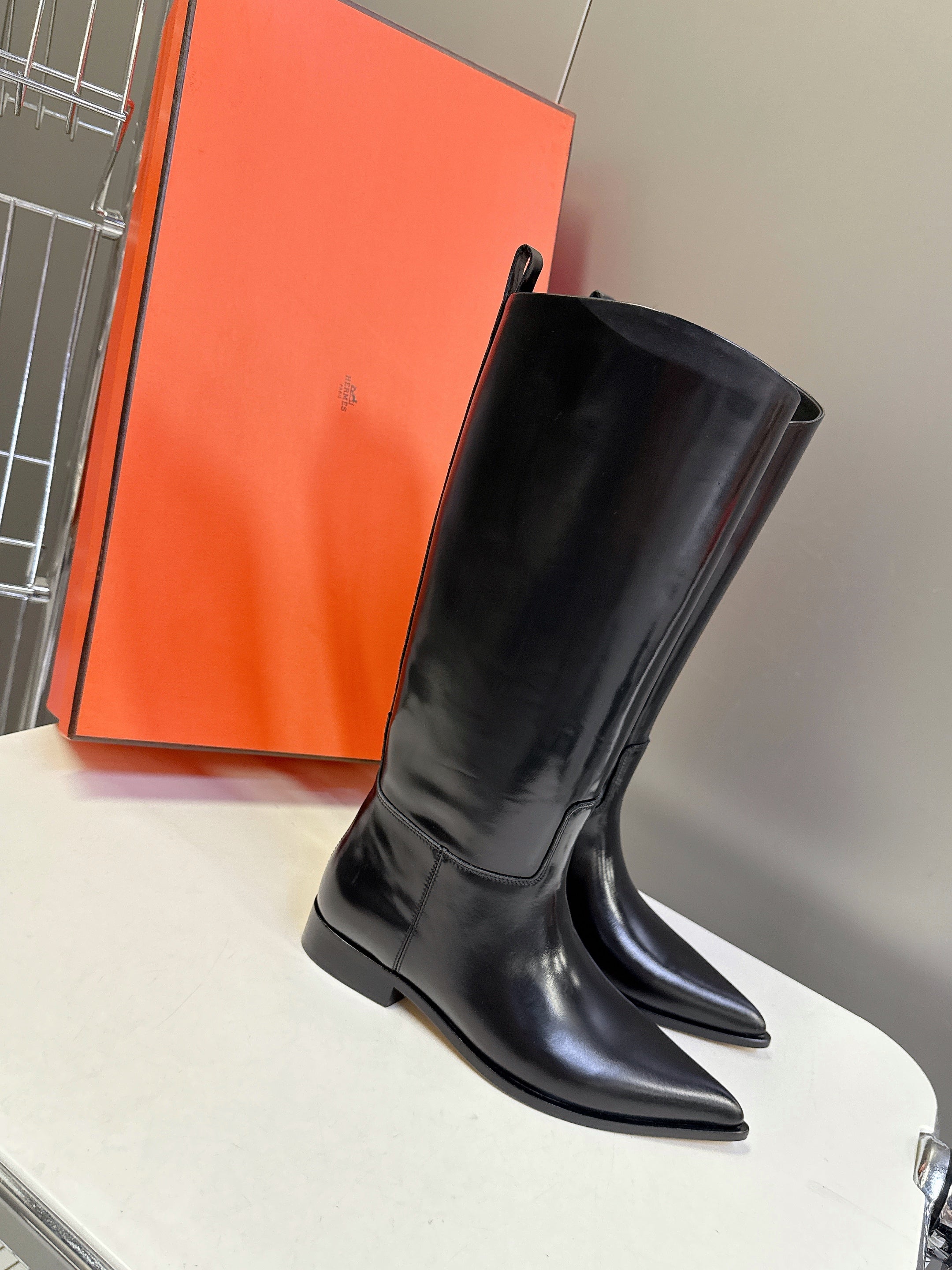 HERMES 25S POINTED-TOE KNEE-HIGH BOOTS IN BLACK GLOSSY LAMBSKIN