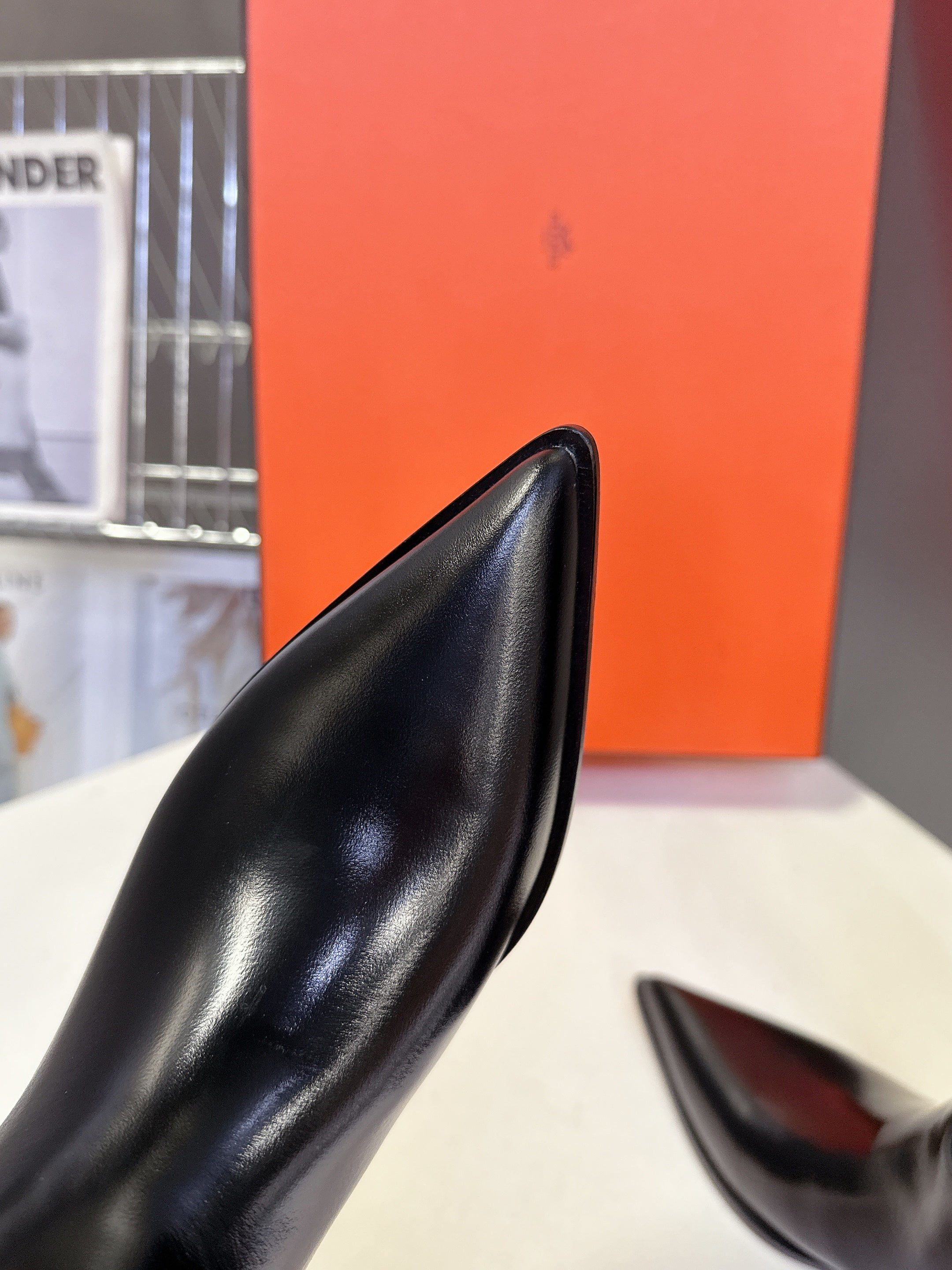 HERMES 25S POINTED-TOE KNEE-HIGH BOOTS IN BLACK GLOSSY LAMBSKIN