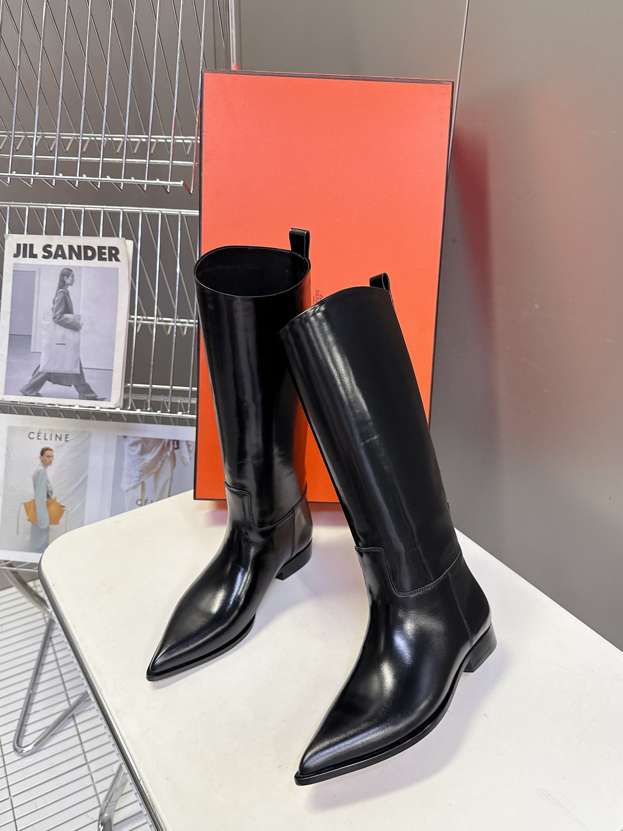 HERMES 25S POINTED-TOE KNEE-HIGH BOOTS IN BLACK GLOSSY LAMBSKIN