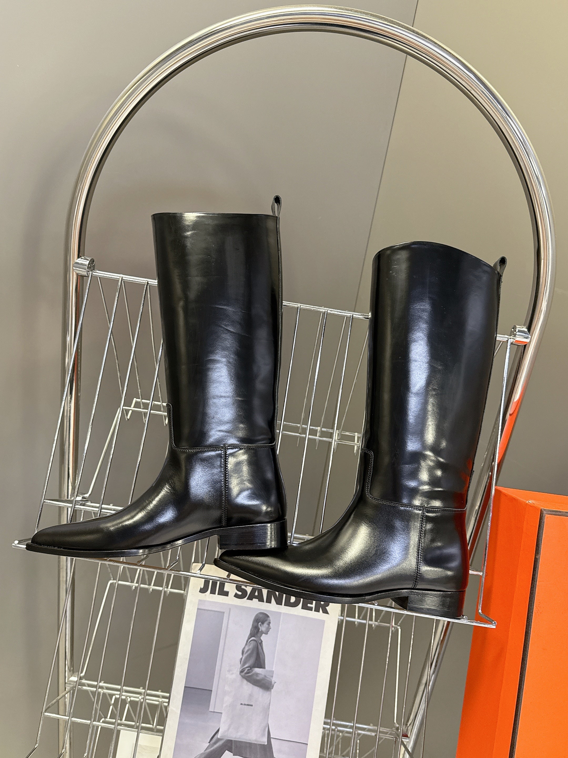 HERMES 25S POINTED-TOE KNEE-HIGH BOOTS IN BLACK GLOSSY LAMBSKIN