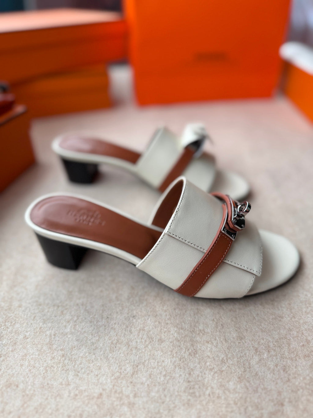 HERMES HIGH MULES IN WHITE CALFSKIN