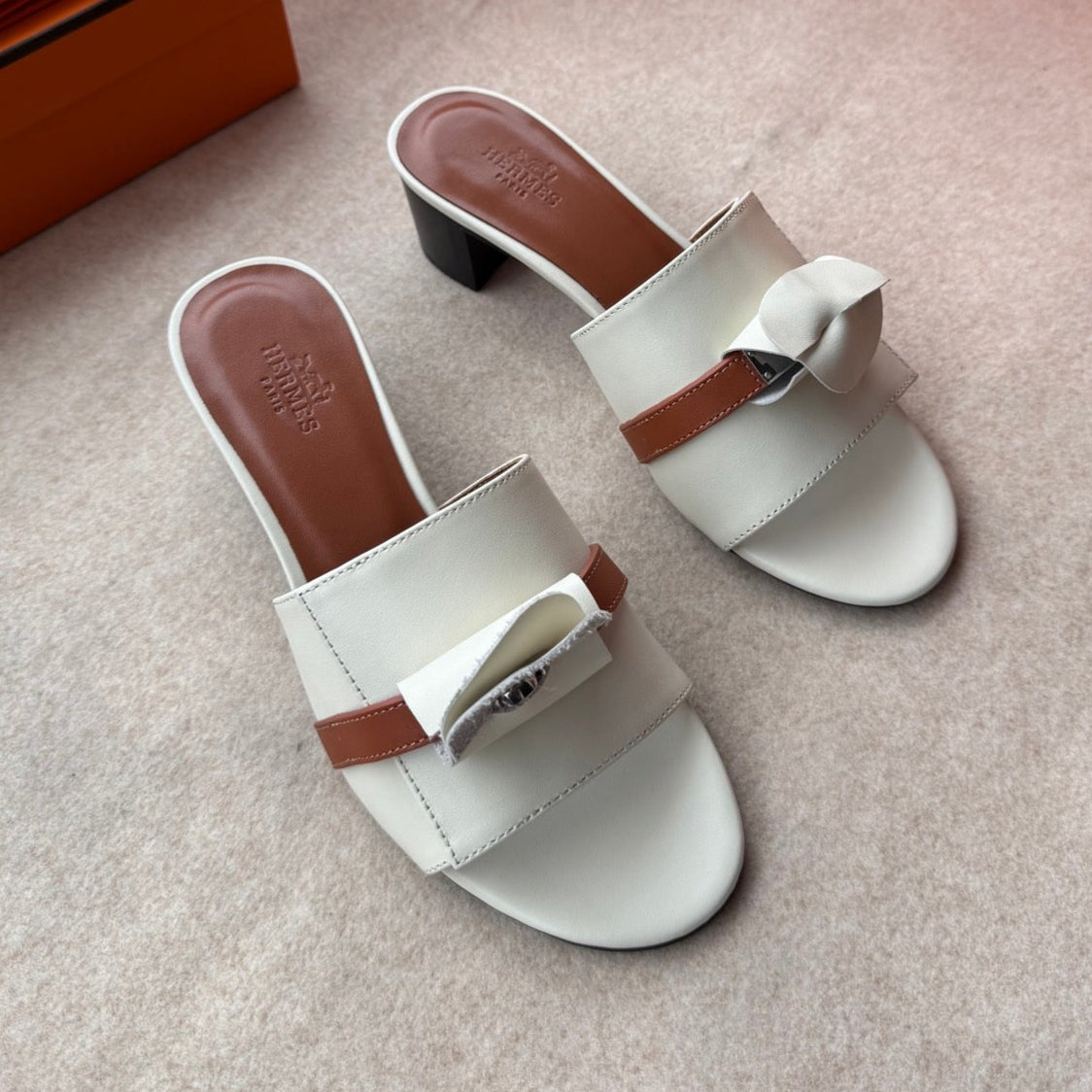 HERMES HIGH MULES IN WHITE CALFSKIN