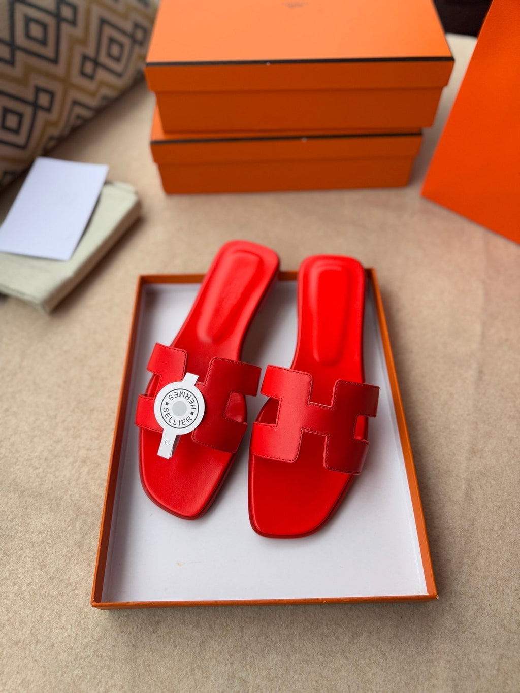 HERMES 0RAN SANDALS IN CHERRY RED CALFSKIN