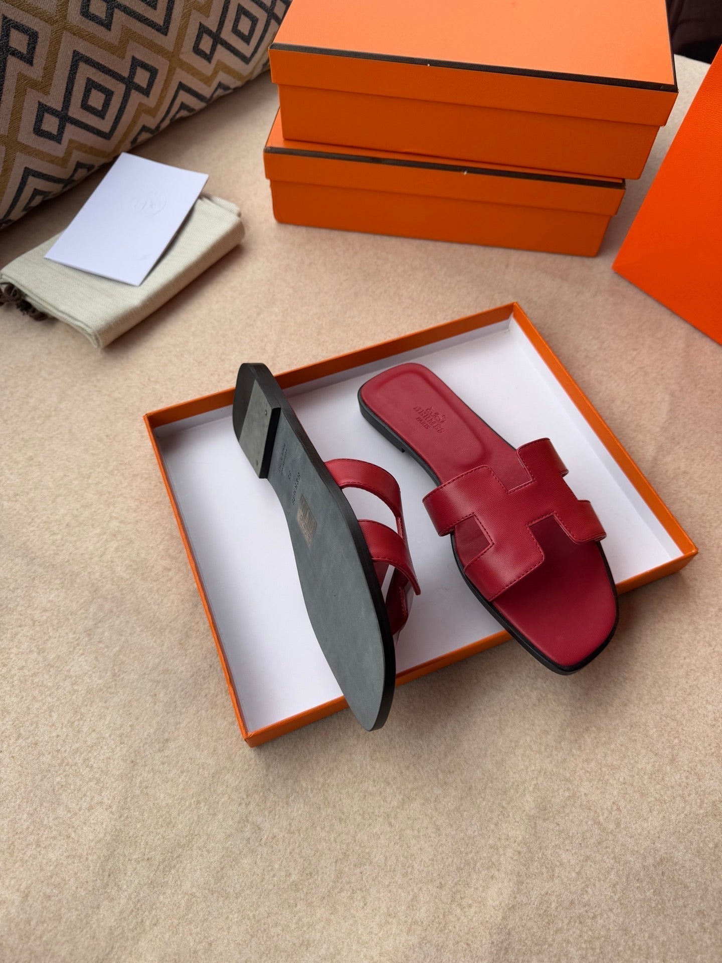 HERMES 0RAN SANDALS IN JAM RED CALFSKIN