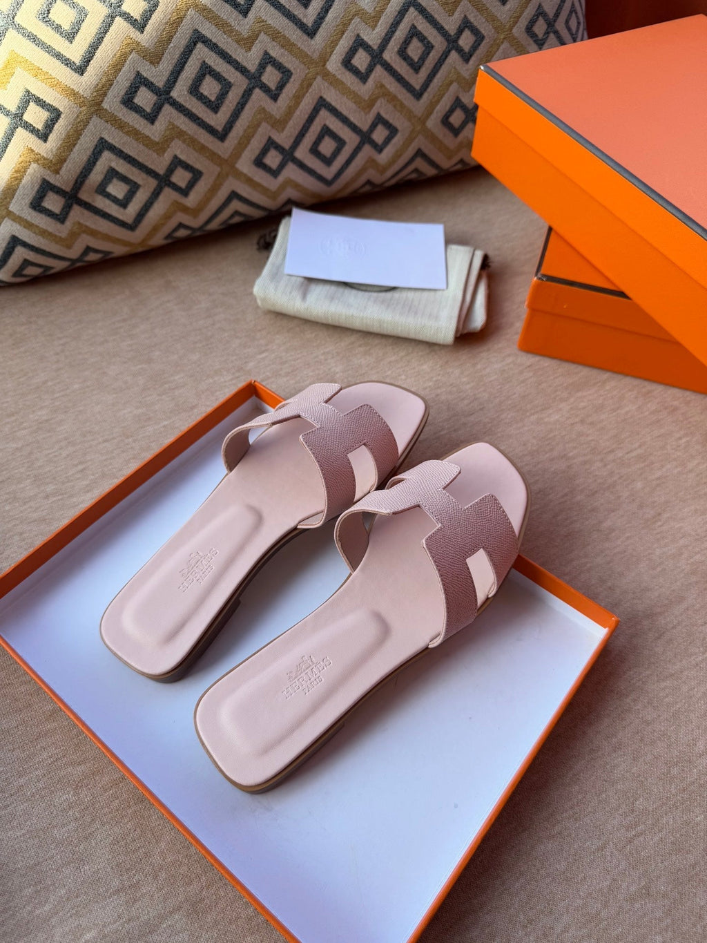 HERMES 0RAN SANDALS IN PASTEL PINK CALFSKIN