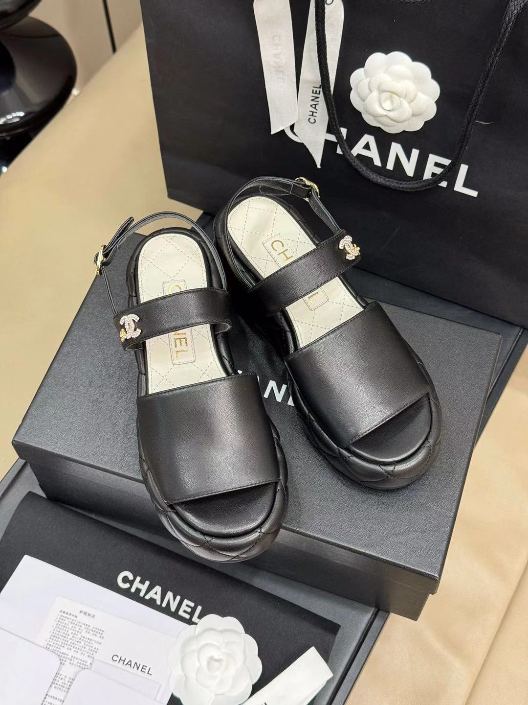 CHANEL HIGH WEDGE SANDALS IN BLACK LAMBSKIN