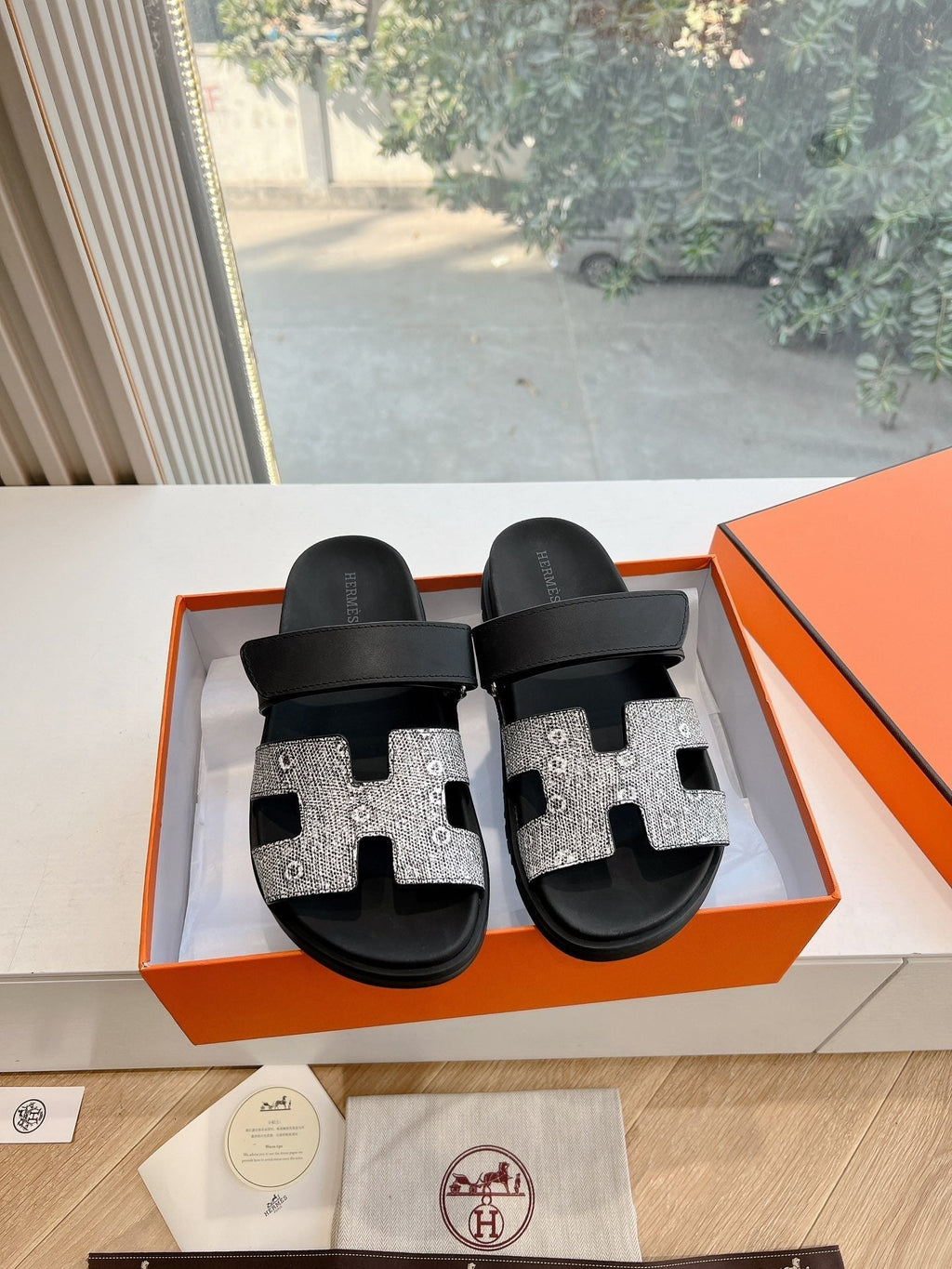 HERMES CHYPRE SANDAL IN BLACK MIX WHITE LIZARD SKIN