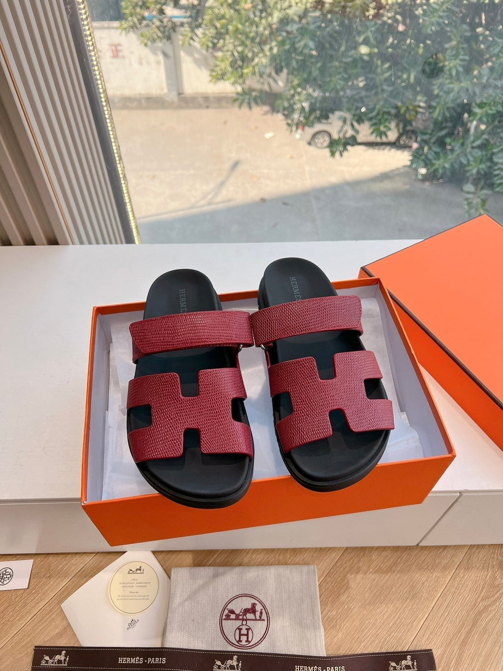 HERMES CHYPRE SANDAL IN CURRANT RED SHINY GRAINED CALFSKIN