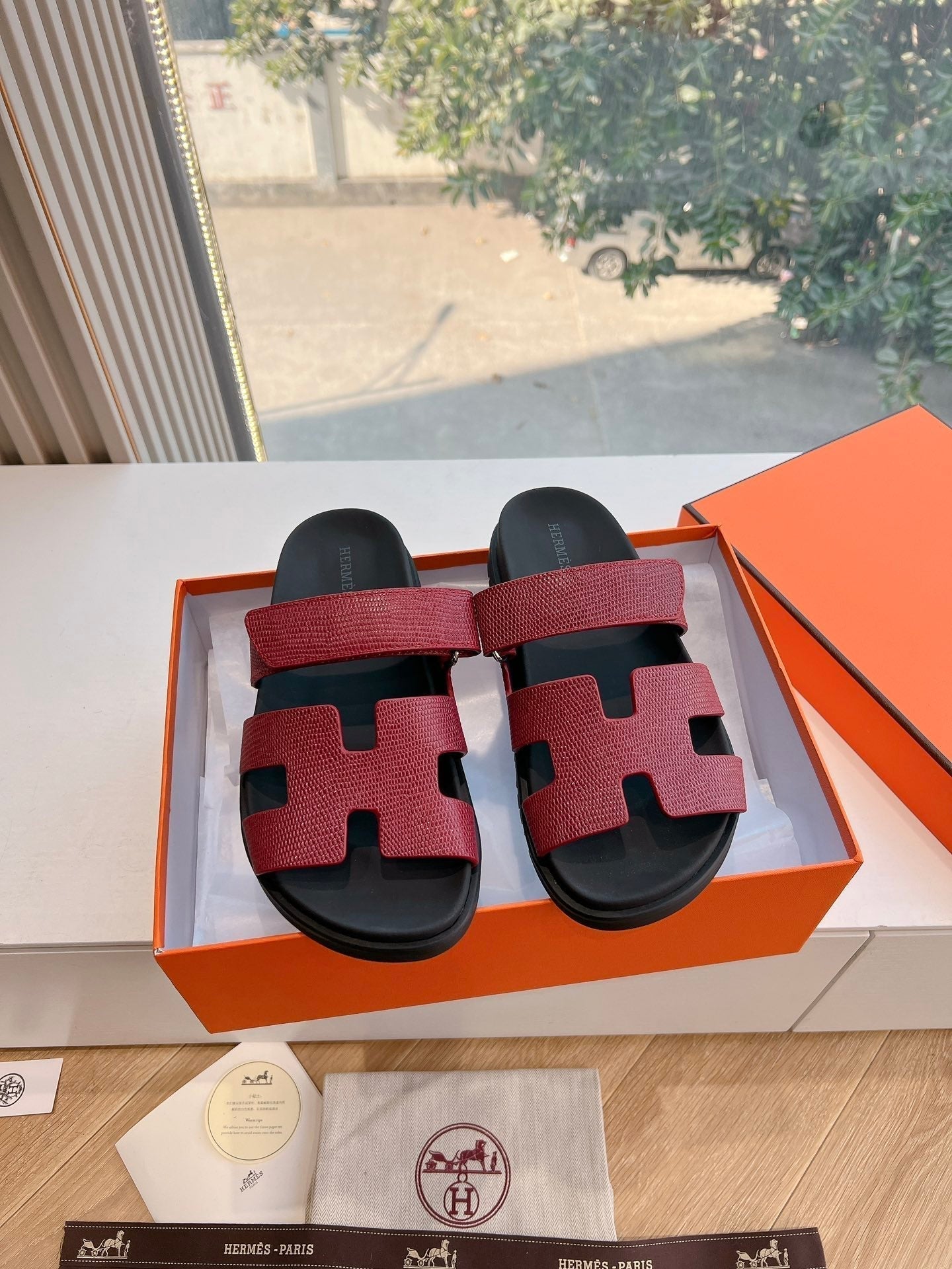 HERMES CHYPRE SANDAL IN CURRANT RED SHINY GRAINED CALFSKIN