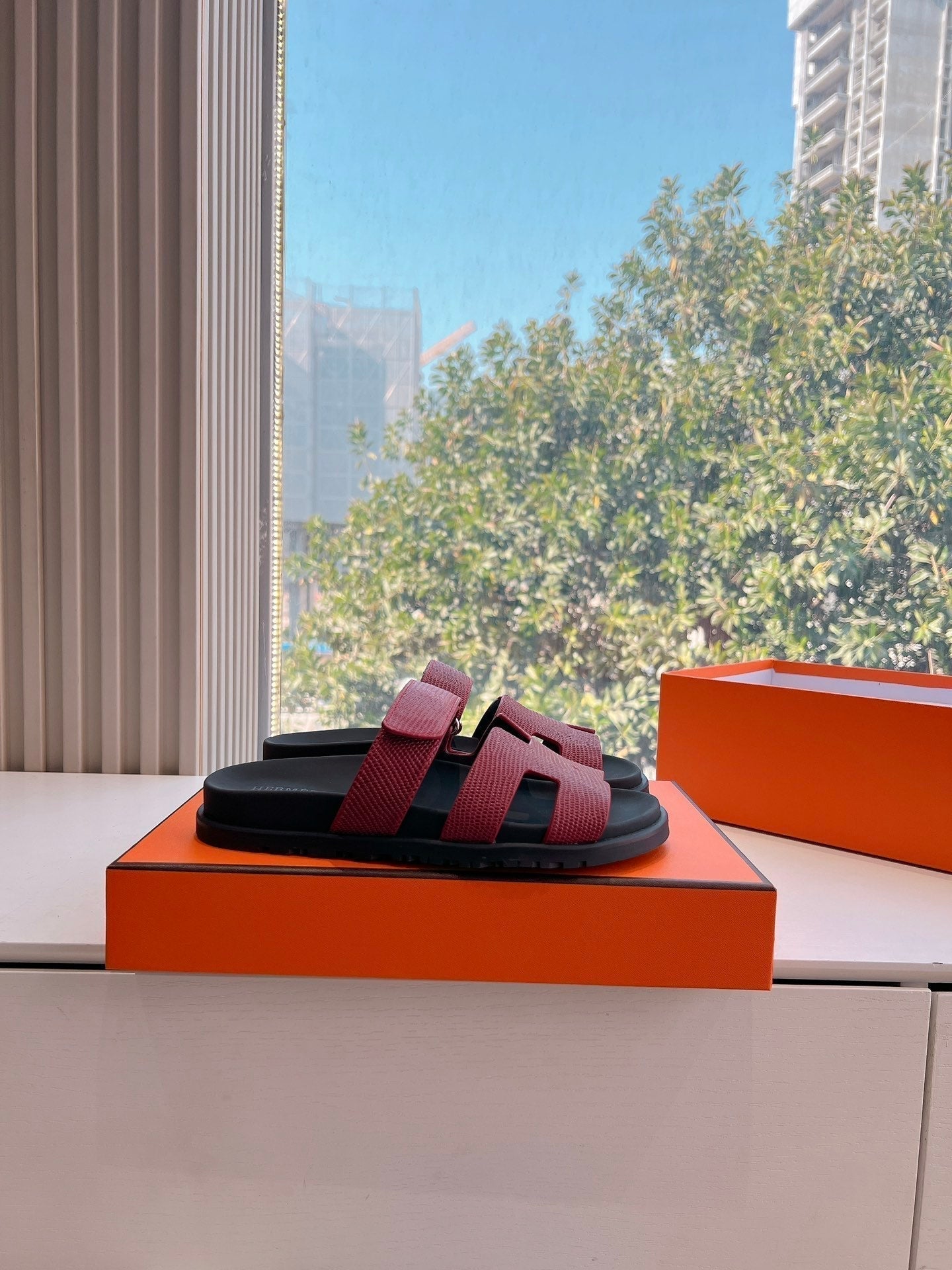 HERMES CHYPRE SANDAL IN CURRANT RED SHINY GRAINED CALFSKIN