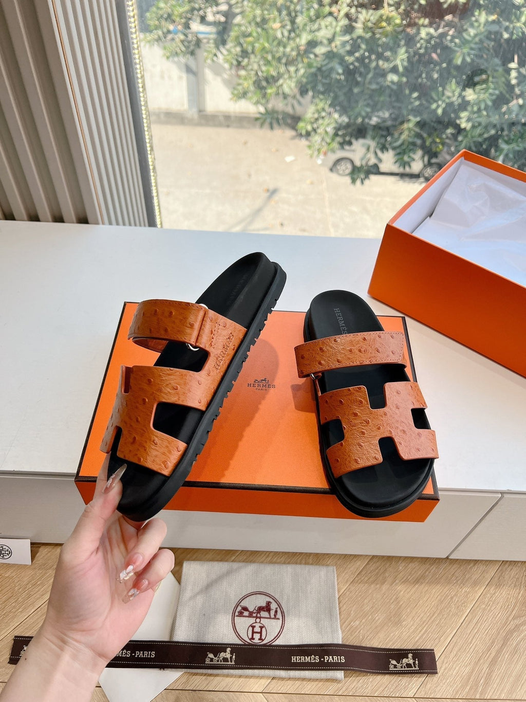 HERMES CHYPRE SANDAL IN VIVID ORANGE GRAINED CALFSKIN