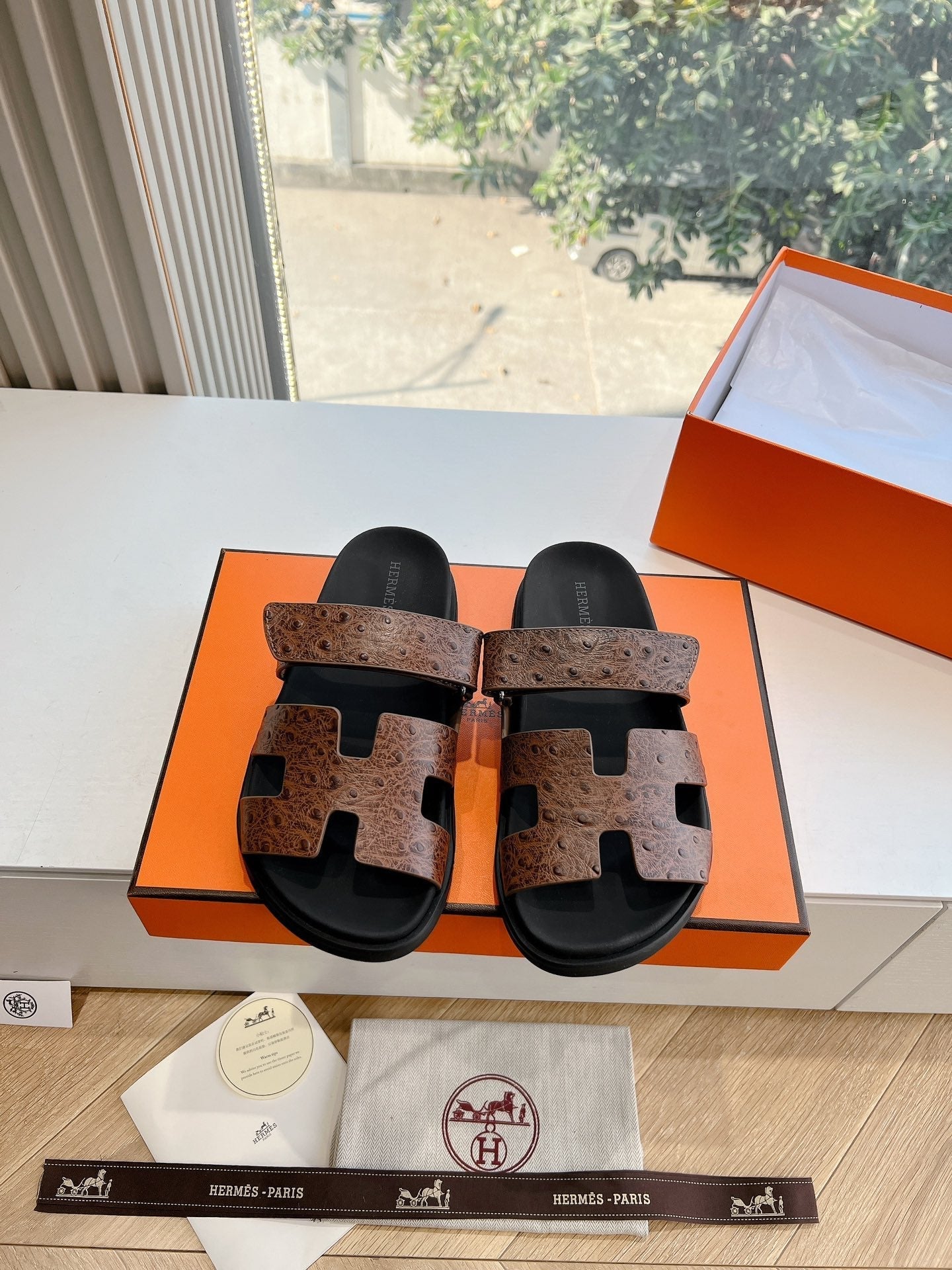 HERMES CHYPRE SANDAL IN CHOCOLATE BROWN GRAINED CALFSKIN
