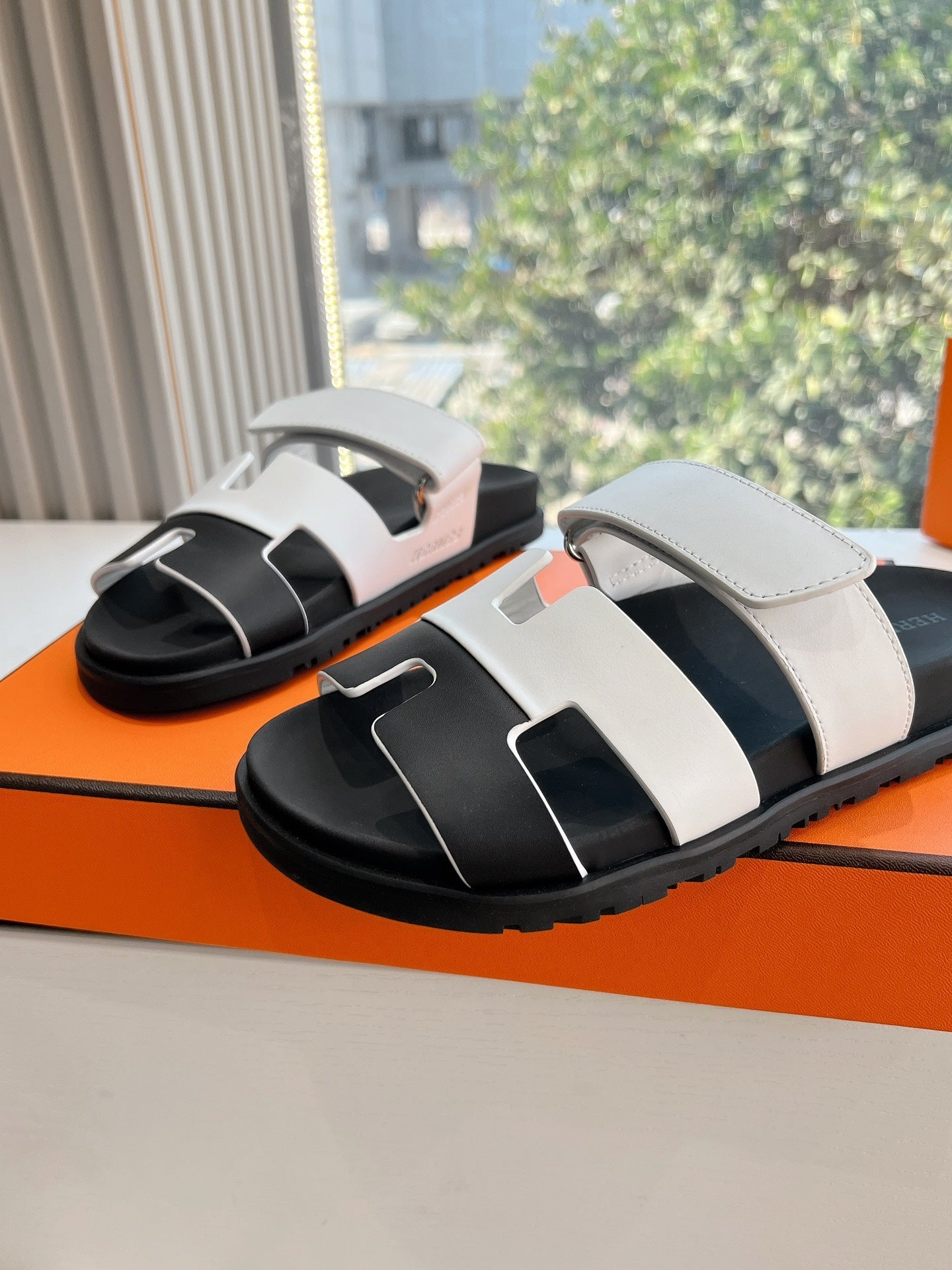 HERMES CHYPRE SANDAL IN WHITE MIX BLACK CALFSKIN