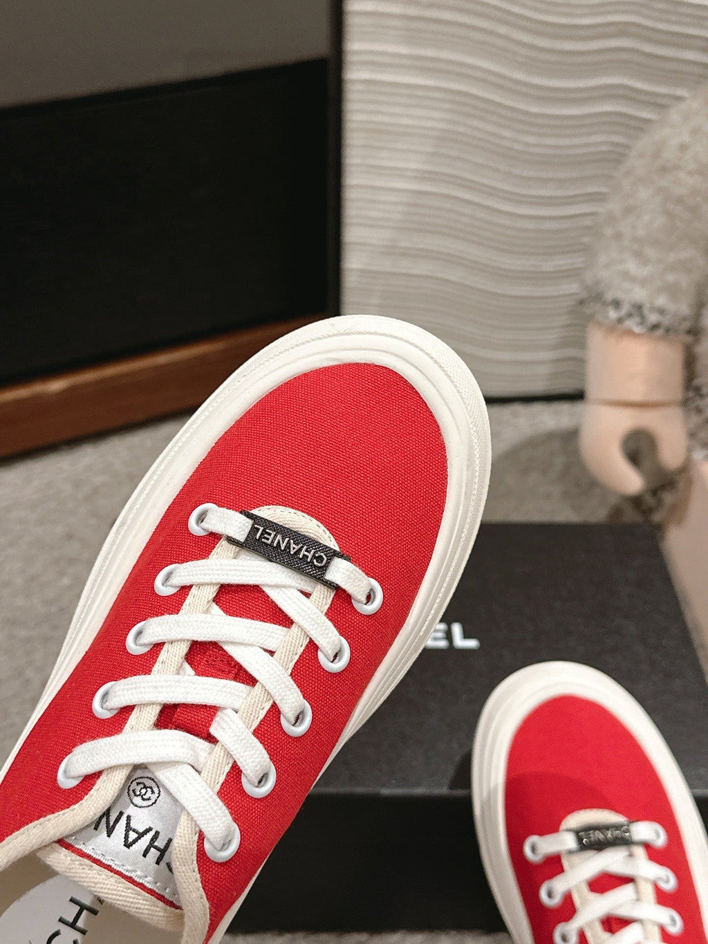 CHANEL LACE-UP SNEAKERS IN CHERRY RED CANVAS