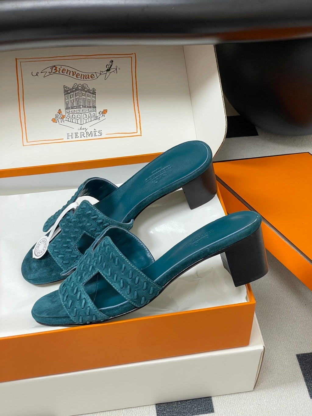 HERMES 25S ORAN HIGH‑HEEL SANDAL IN DARK BLUE SUEDE AND LAMBSKIN