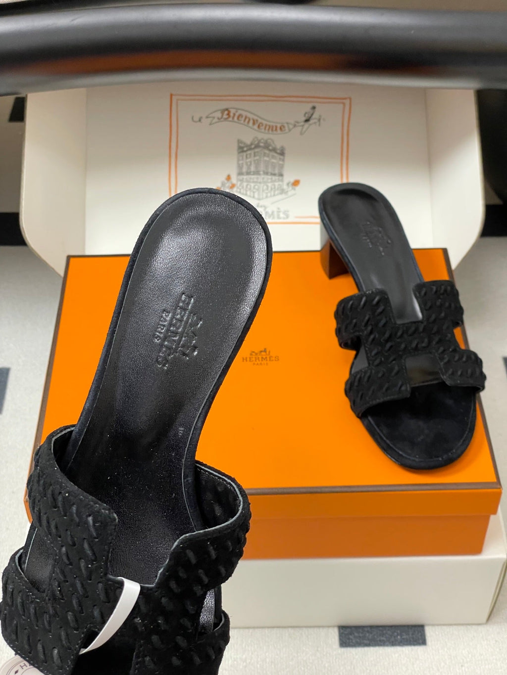 HERMES 25S ORAN HIGH‑HEEL SANDAL IN BLACK SUEDE AND LAMBSKIN