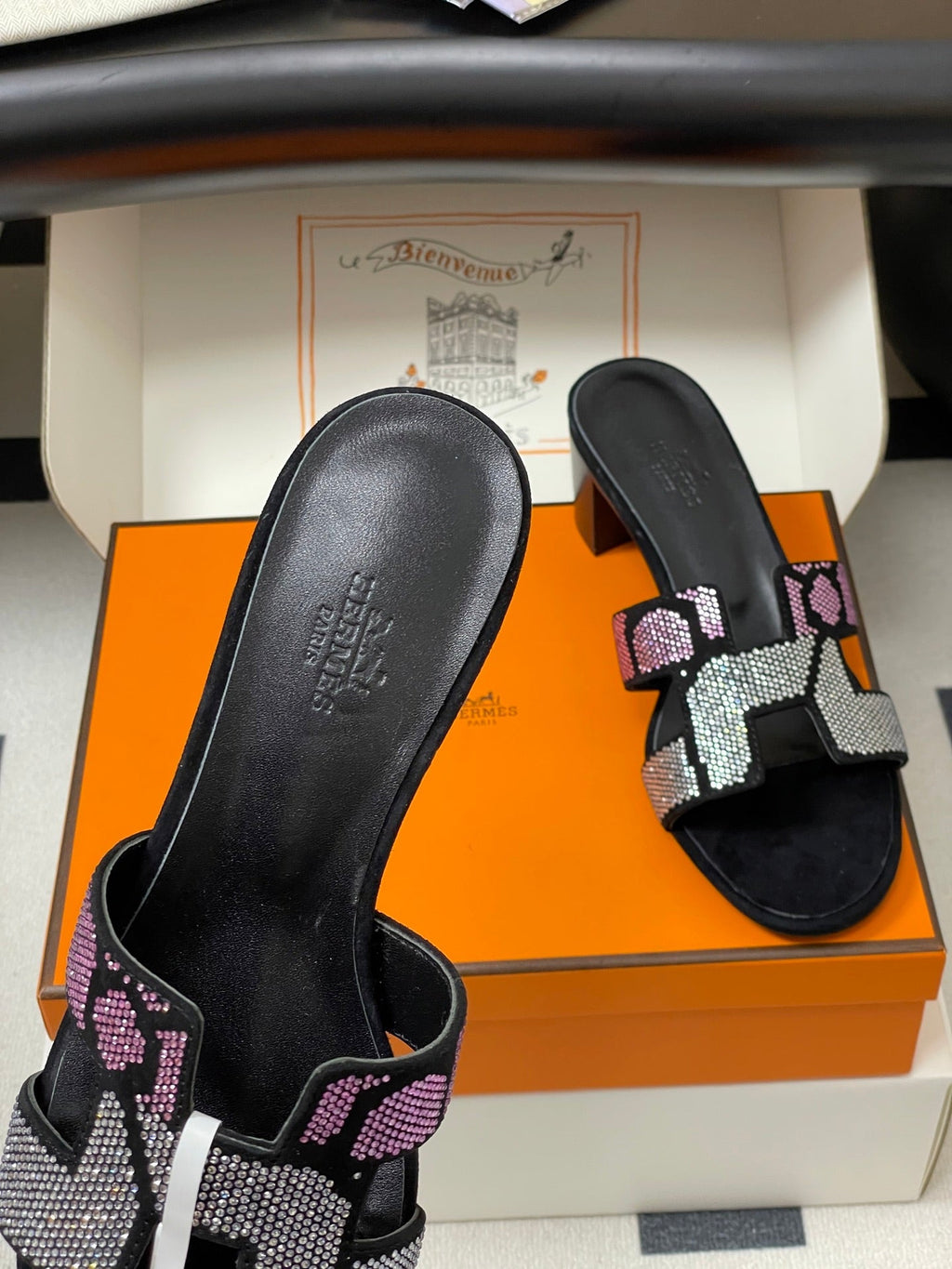 HERMES 25S ORAN HIGH‑HEEL SANDAL 50 MM IN BLACK LAMBSKIN WITH WHITE MIX PINK STONE DETAILS