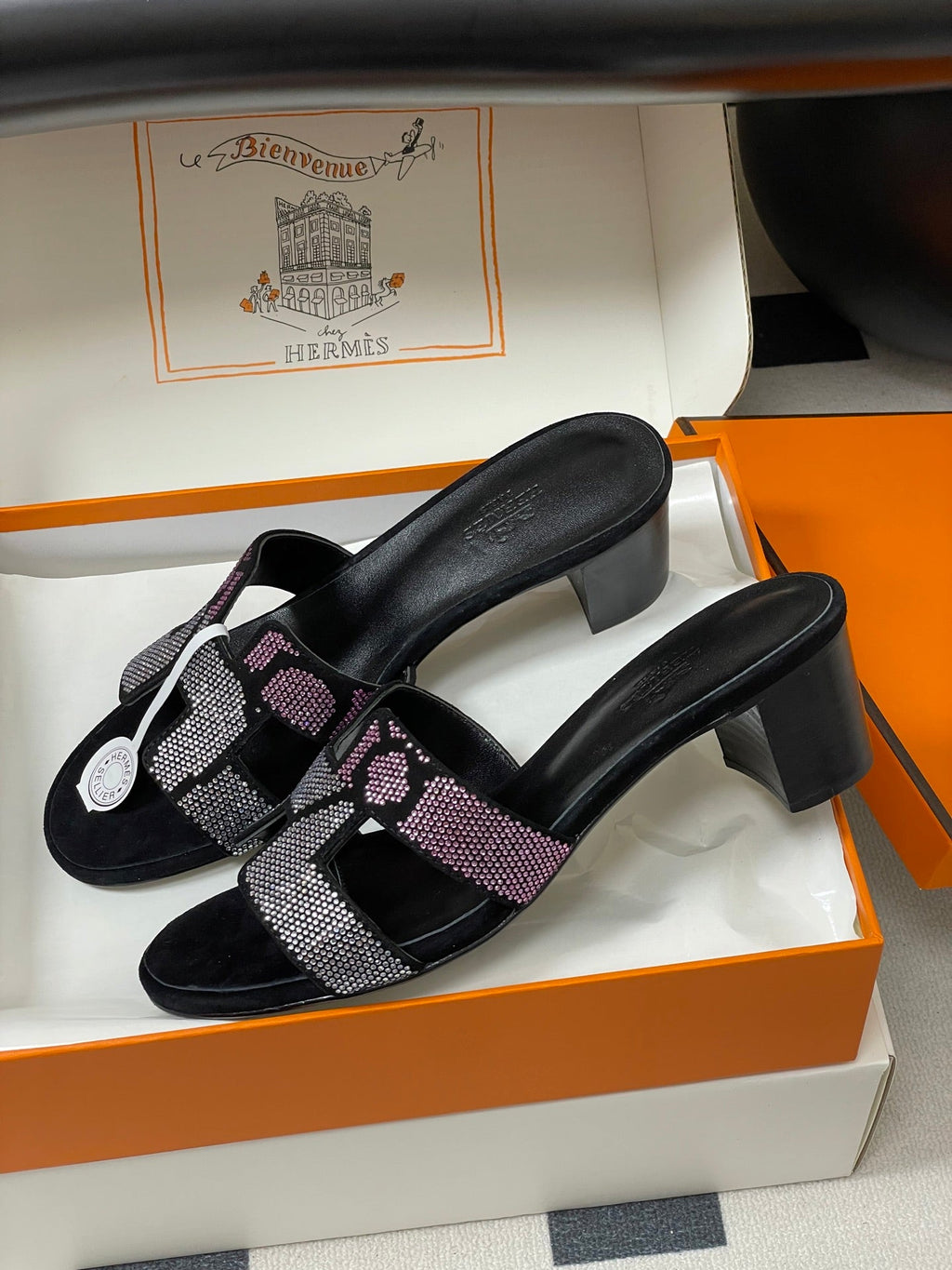 HERMES 25S ORAN HIGH‑HEEL SANDAL 50 MM IN BLACK LAMBSKIN WITH WHITE MIX PINK STONE DETAILS