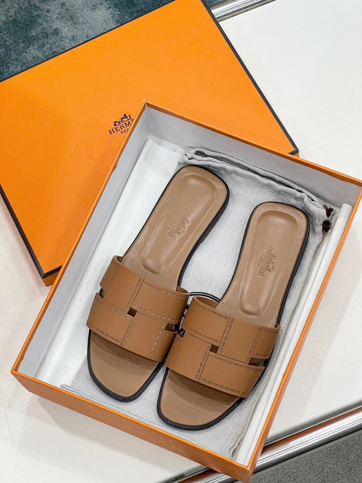 HERMES IDIOMA SANDAL IN BRONZE BROWN CALFSKIN