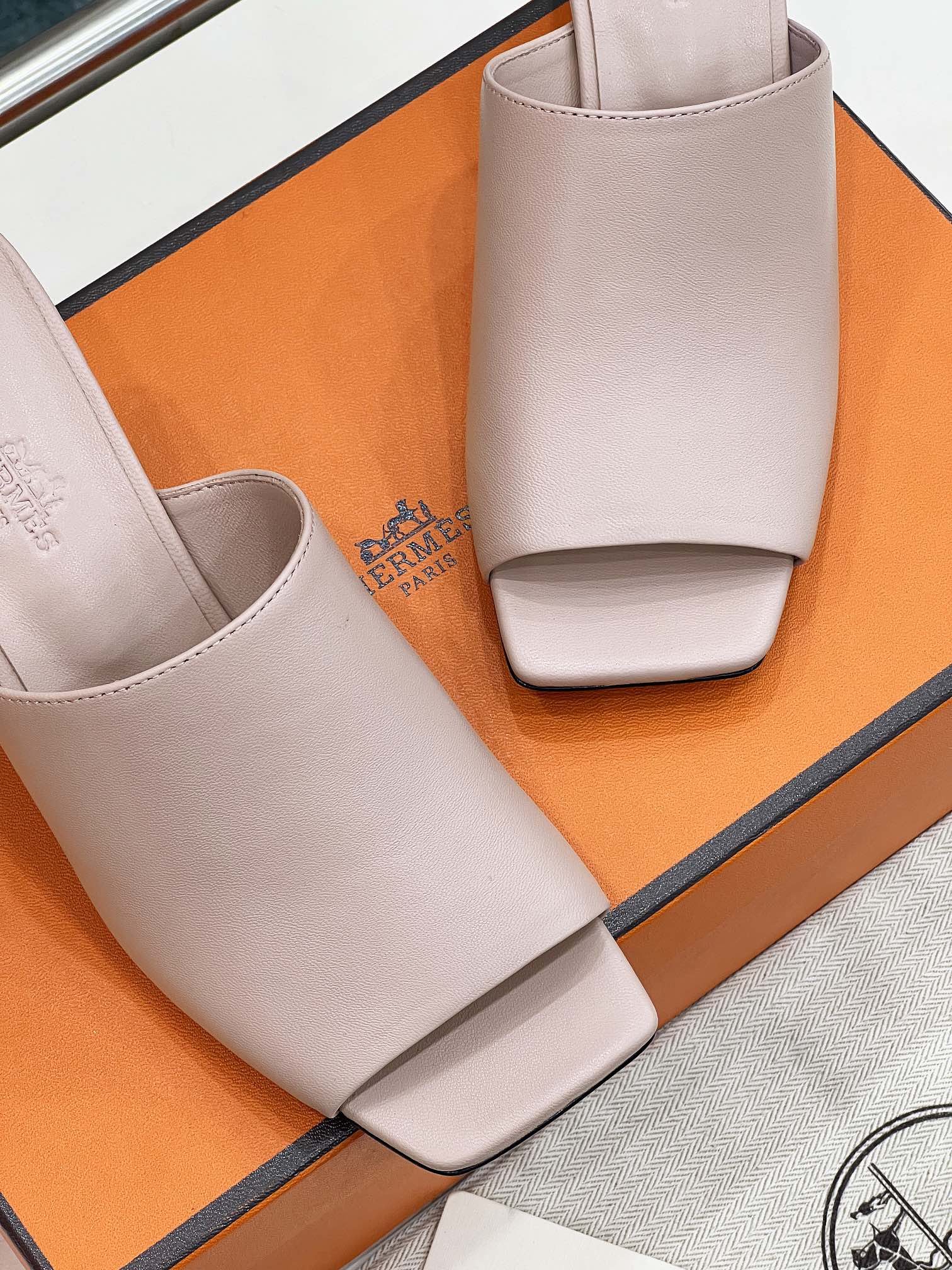 HERMES ICONIQUE 60 SANDAL IN BABY PINK CALFSKIN