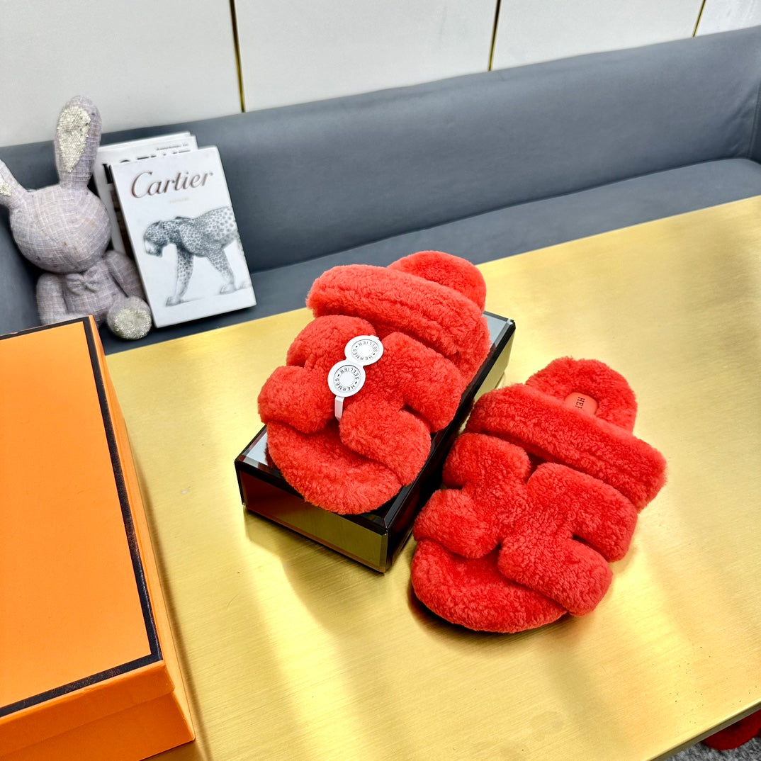 HERMES CHYPRE SANDAL IN CANDY RED SHEARLING