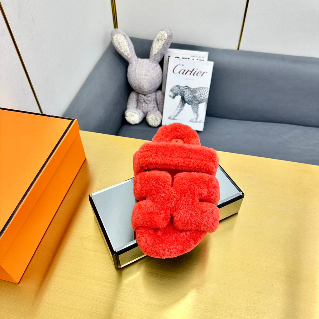 HERMES CHYPRE SANDAL IN CANDY RED SHEARLING